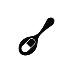 Silhouette of a spoon holding a single capsule or pill on a white background