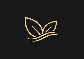 Elegant gold leaf logo design with smooth waves, representing balance, nature, and luxury brand style.