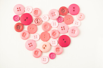 a heart shape made out of buttons