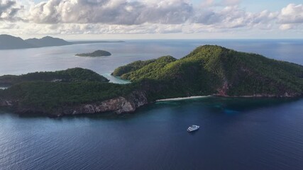 The beautiful island of Pulau Tellang, lies east of Alor, Indonesia. This area in the Banda Sea is known for its diverse coral reefs and spectacular scuba diving and snorkeling.
