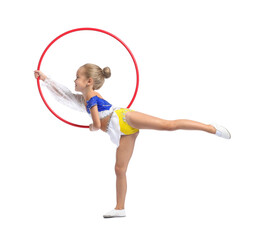 Little girl with hula hoop doing gymnastic exercise on white background