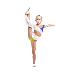 Smiling little girl doing gymnastic exercise on white background