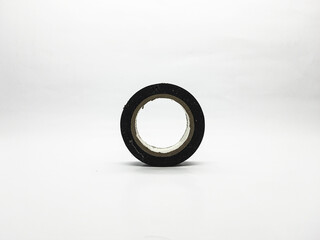 Black electrical tape roll sits upright on a white background ready for electrical work projects offering insulation protection and secure adhesion for various wiring applications.