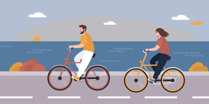 Love couple riding bicycles on seacoast. Friends riding bikes. Bike path on embankment, beautiful sunset. Ocean view on background. Cycling, free time, activity at weekend.
