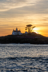 Crescent City lighthouse at sunset