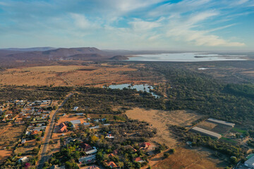 aerial view of african village, mountain range and lake, Tlokweng suburbia in Gaborone, Botswana
