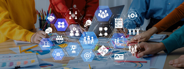 Fototapeta na wymiar The concept of teamwork fosters collaboration for business success. Effective teamwork enhances communication and productivity, leading to the achievement of shared organizational goals. Entice