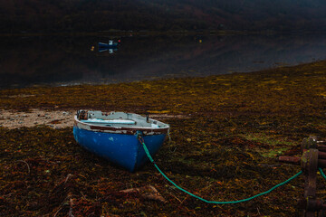Strontian Jetty and slipaway extending into the tranquil waters of Loch Sunart, Scottish Highlands, on a peaceful day