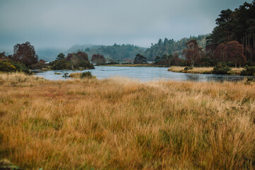 Acharacle, Scotland Highlands - River Shiel with clouds covering the mountains in the background on an overcast Autumn morning