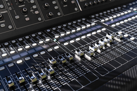 Mixer control. Music engineer. Backstage controls on an audio mixer, Sound mixer. Professional audio mixing console with lights, buttons, faders and sliders. sound check for concert. live broadcast.
