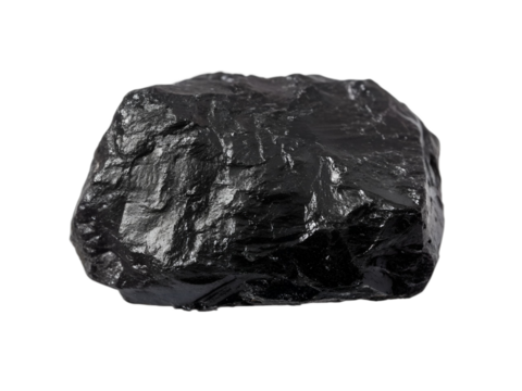 Lump of coal rock on a dark backdrop showcasing its rough texture and shiny surface