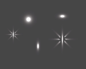 Abstract bokeh light effects with starburst patterns and blurred orbs on a dark background