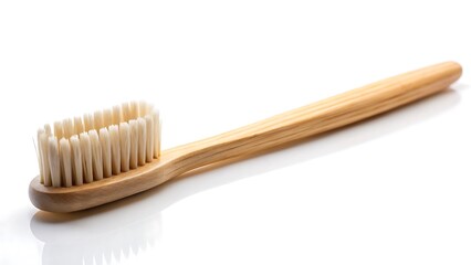 Natural bamboo toothbrush with white bristles isolated on a clean white background natural toothbrush