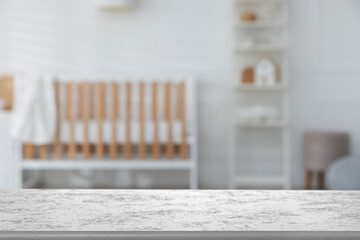 Empty table in baby room. Space for design