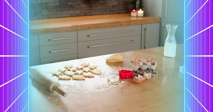 Flour dusting island while dough cutouts lying by rolling pin and cutters awaiting baking prep