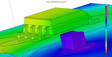 Computer 3d modeling of printed circuit board of electronic device. Investigation of displacement of pcb conductors and components (capacitor, integrated circuit) under influence of high temperature. © TKalinovskaya