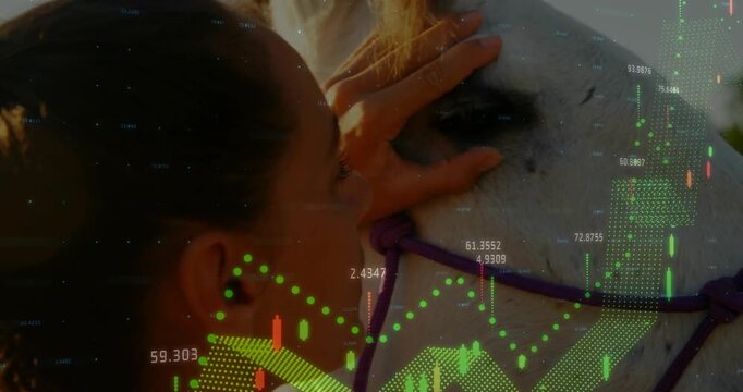 Veterinary assistant walking to horse in purple halter and lifting eyelid with finger for vet check