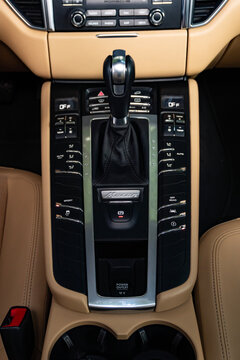 Porsche Macan center console top view, luxury SUV interior controls