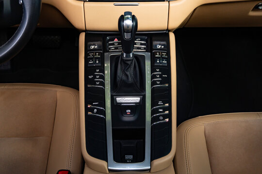 Porsche Macan center console top view, luxury SUV interior controls