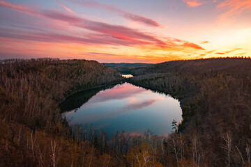 Golden Sunset Reflecting on Tranquil Northern Lake