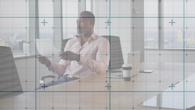 Male executive shifting report, initiating animated highlights on key lines for business analysis