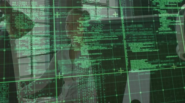 Male colleague leaning in pointing at code overlay, female developer debugging and compiling code