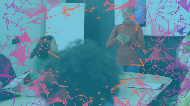 Team lead opening business briefing by gesturing at flip chart and screen while participants noting