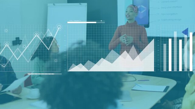 Presenter gesturing at screen in business meeting, activating line graph into bar-chart global map