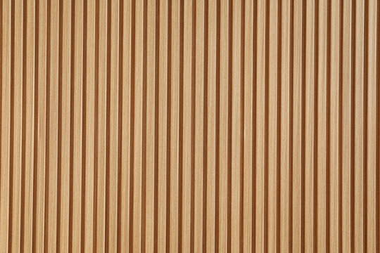 Beige colored wooden panel wall background
