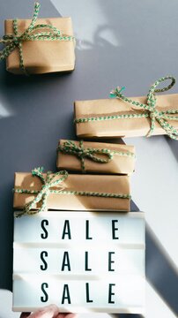 Sale text flowing over freebies and discount percentages overhead shot