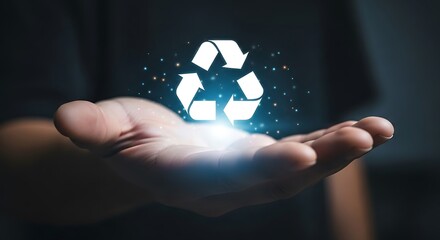 White recycling symbol glowing above open palm with sparkling particles hand