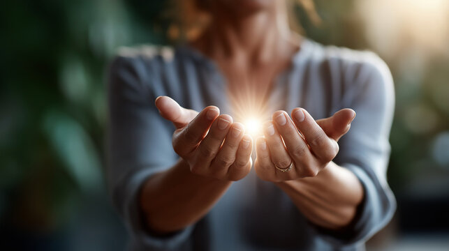 Hands positioned over body showing chakra energy face obscured reiki healing energy work spiritual healing chakra therapy holistic treatment energy medicine healing touch