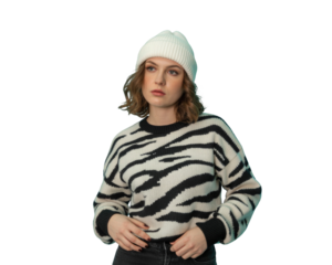 Young woman wearing a white beanie and zebra print sweater isolated on transparent background