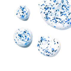 Close-up of white cream with blue exfoliating scrub particles on white background.
