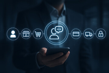 A hand holding a smartphone with glowing icons for customer service, shop, shopping cart, delivery truck, and padlock, representing e-commerce and retail management