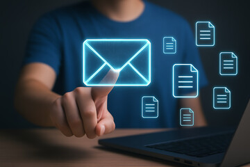 Person pointing to a glowing digital envelope icon representing email and messaging with document icons floating around, symbolizing electronic communication and data transfer