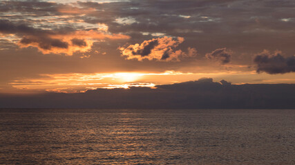 Dawn with dramatic clouds over the Aegean Sea