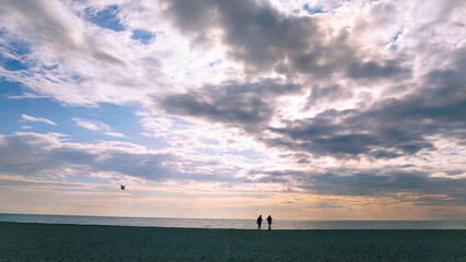Landscape of sky with lighted clouds. Beautiful clouds over the sea