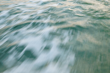 Blurred motion of ocean waves capturing dynamic flow and serenity