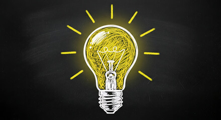 Light bulb drawing on chalkboard representing idea and inspiration concept