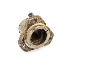 A close-up of a dirty, oily wheel hub assembly with bolts on a white background. The image reflects the essence of repair and maintenance.