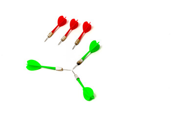 Strategic dart arrangement highlighting precision and target achievement with red and green darts