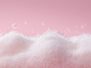 Fototapeta premium White Microfoam Rising on Pastel Pink Background — Minimalist Skincare Concept