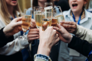 Group of businessmen celebrate acquisition, closing successful merge deal, clinking raise glasses with alcohol, sparkling wine, toasting and cheering, colleagues office team corporate party event