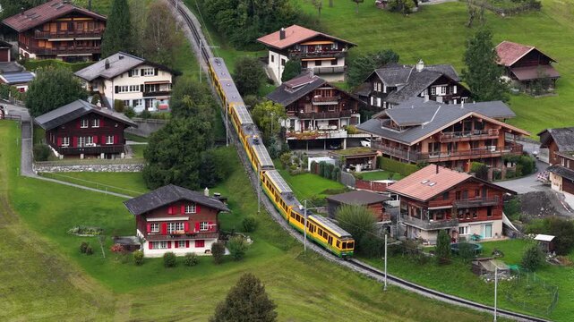 train moving through grindelwald switzerland