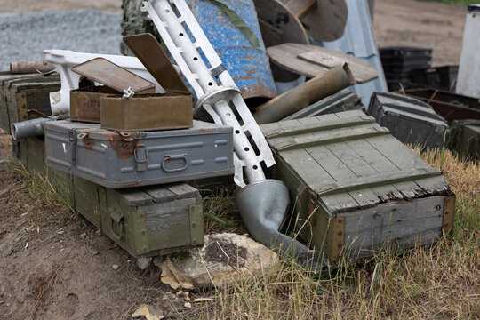 A farmer's improvised museum of Russian occupation artifacts, collected from his fields. The display includes military debris and a toilet bowl, satirizing the looting by soldiers.