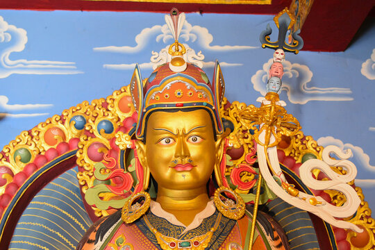 Face of Guru Padmasambhava, also known as Guru Rinpoche, revered figure in Tibetan Buddhism. Lotus born, he appeared on a lotus flower. Rinchen Chholing Monastery, Sikkim, India. Buddhist arts.