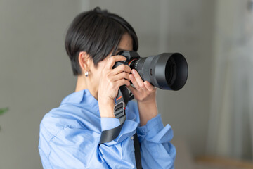 女性　フォトグラファー　カメラマン