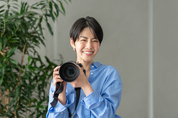 女性　フォトグラファー　カメラマン
