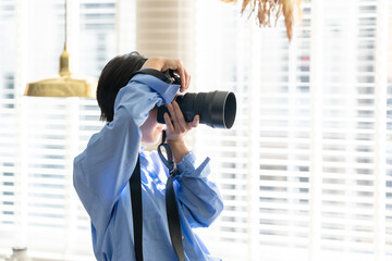 女性　フォトグラファー　カメラマン